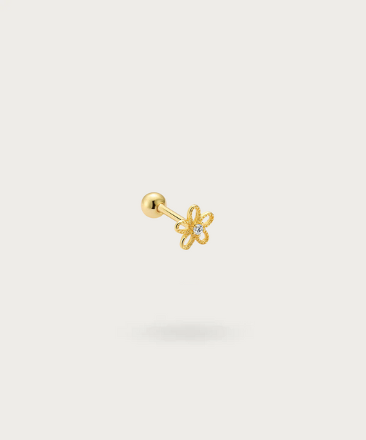Immagine del Piercing Trago con motivo floreale dorato, vista frontale
