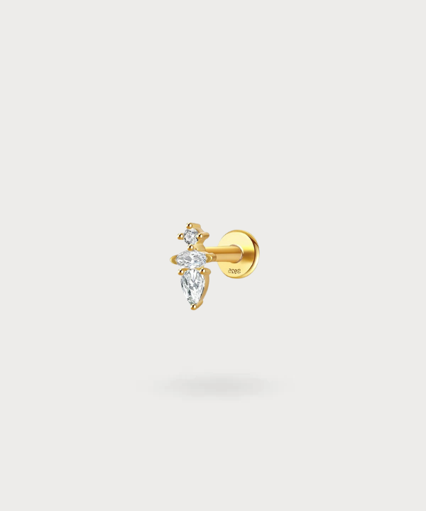 Piercing forward helix Ariadni, una cascata di zirconi in oro per un'eleganza classica.