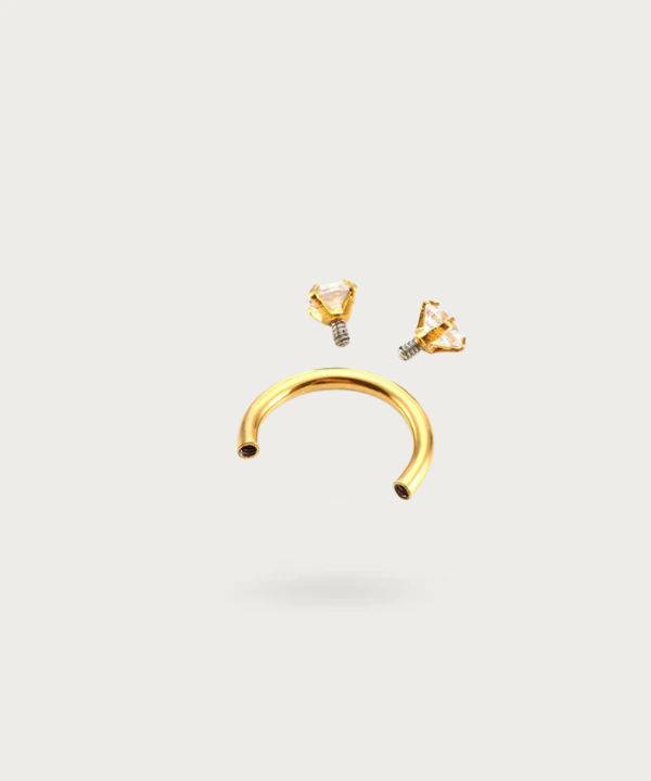 piercing sfera lobo dorata