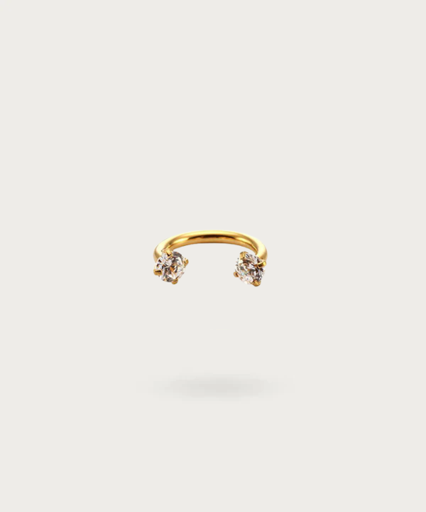 piercing sfera Snug dorato ferro di cavallo