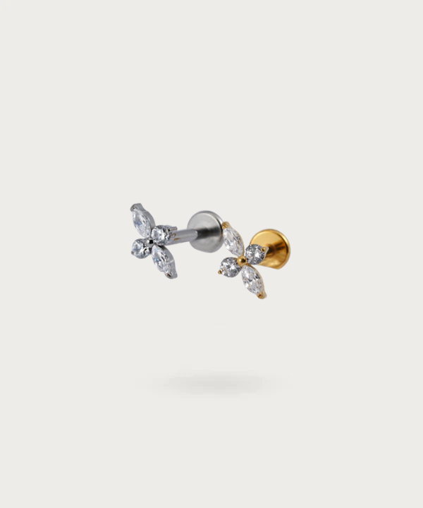 piercing in titanio fiore, dorato e argentato da lato
