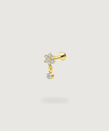 Piercing forward helix Adrianna in oro con un motivo floreale e zirconi.