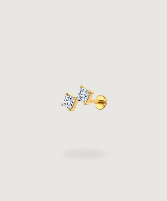 Piercing Lobo Nayra, eleganza brillante con un tocco di luce